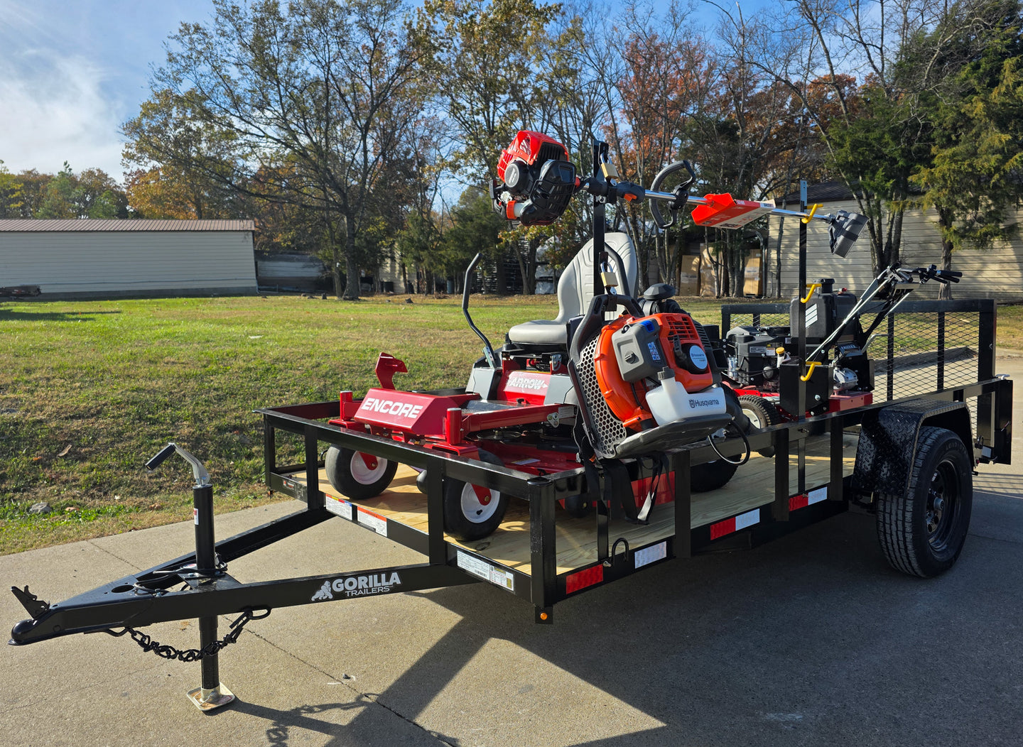 Encore Arrow EA6OXP24LS 60" Zero Turn EW32FS481V 32" Stand On Mower Handheld Utility with Racks Package Front Left 