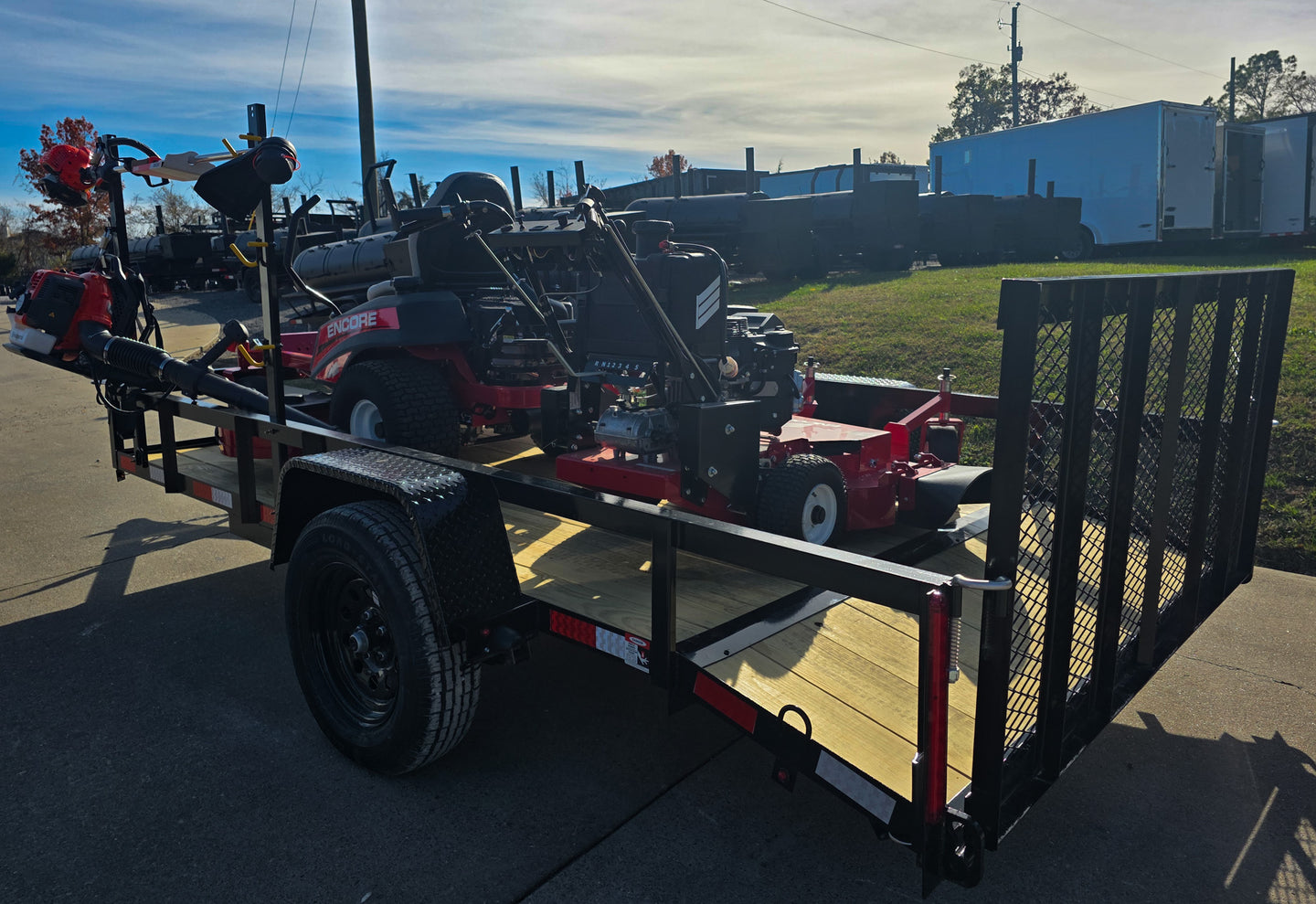 Encore Arrow EA6OXP24LS 60" Zero Turn EW32FS481V 32" Stand On Mower Handheld Utility with Racks Package Left Rear Gate Up