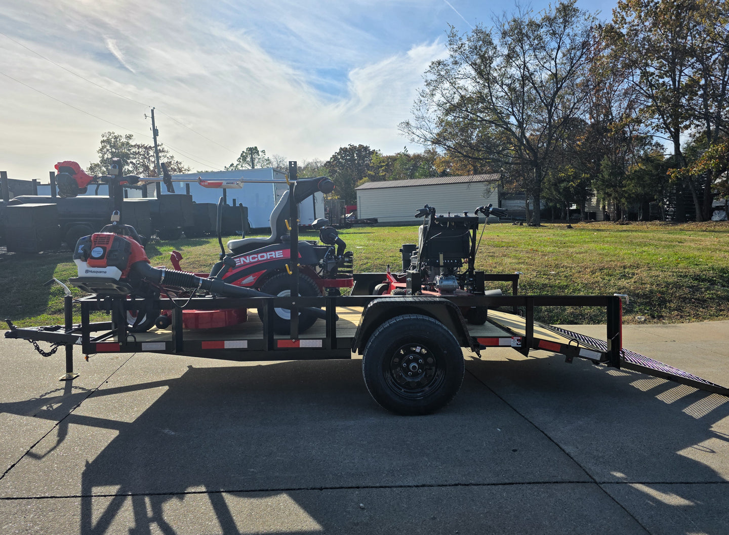 Encore Arrow EA6OXP24LS 60" Zero Turn EW32FS481V 32" Stand On Mower Handheld Utility with Racks Package Left Side Gate Down