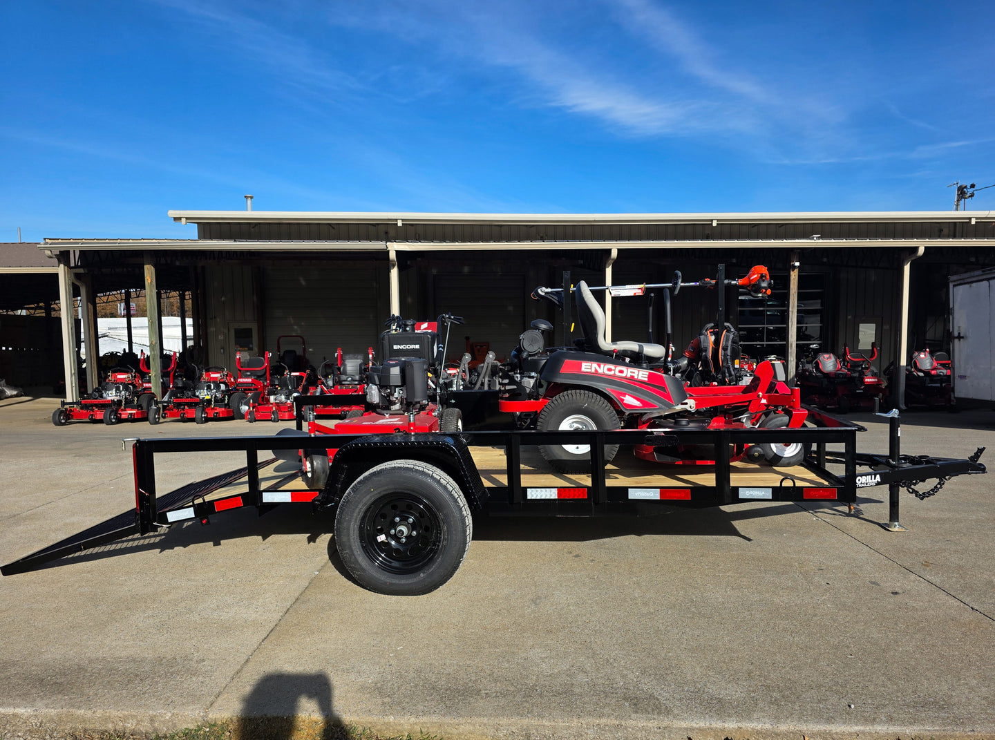 Encore Arrow EA6OXP24LS 60" Zero Turn EW32FS481V 32" Stand On Mower Handheld Utility with Racks Package Right Side Gate Down