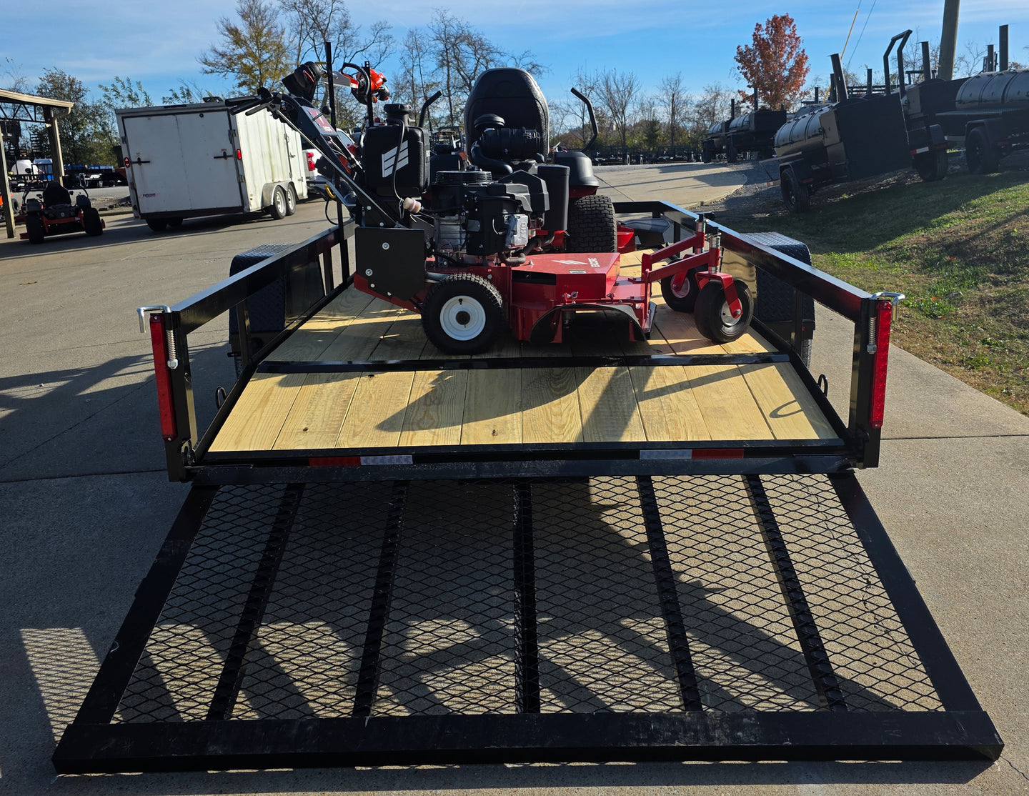 Encore Arrow EA6OXP24LS 60" Zero Turn EW32FS481V 32" Stand On Mower Handheld Utility with Racks Package Rear Gate Down