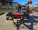 Encore EW32FS481V 32" Stand On Zero Turn Mower Handheld Utility with Racks Package Front 