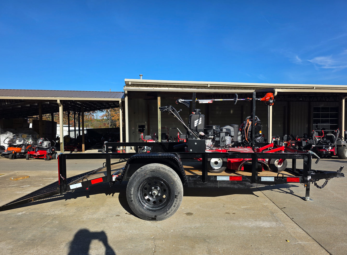 Encore EW32FS481V 32" Stand On Zero Turn Mower Handheld Utility with Racks Package Right Side Gate Down