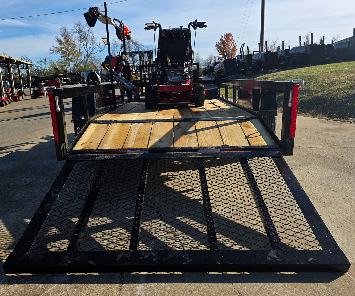 Encore EW32FS481V 32" Stand On Zero Turn Mower Handheld Utility with Racks Package Rear Gate Down