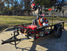 Encore EW32FS481V 32" Stand On Zero Turn Mower Handheld Utility with Racks Package Front Left 