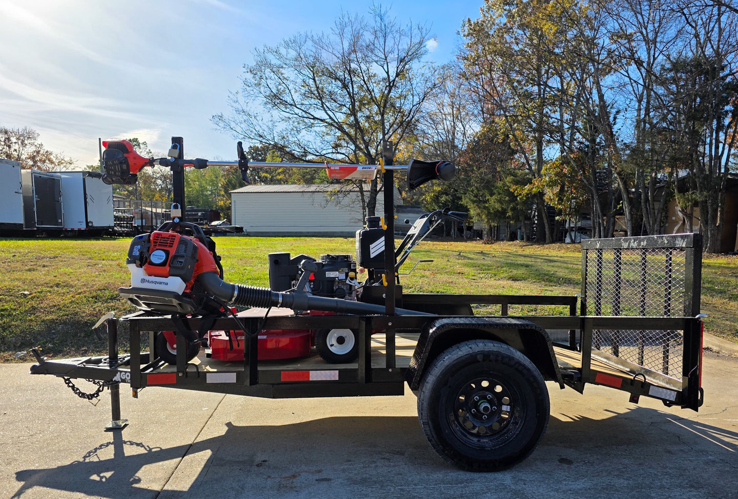 Encore EW32FS481V 32" Stand On Zero Turn Mower Handheld Utility with Racks Package Left Side 