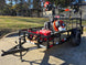 Encore EW32FS481V 32" Stand On Zero Turn Mower Handheld Utility with Racks Package Front Left Gate Up