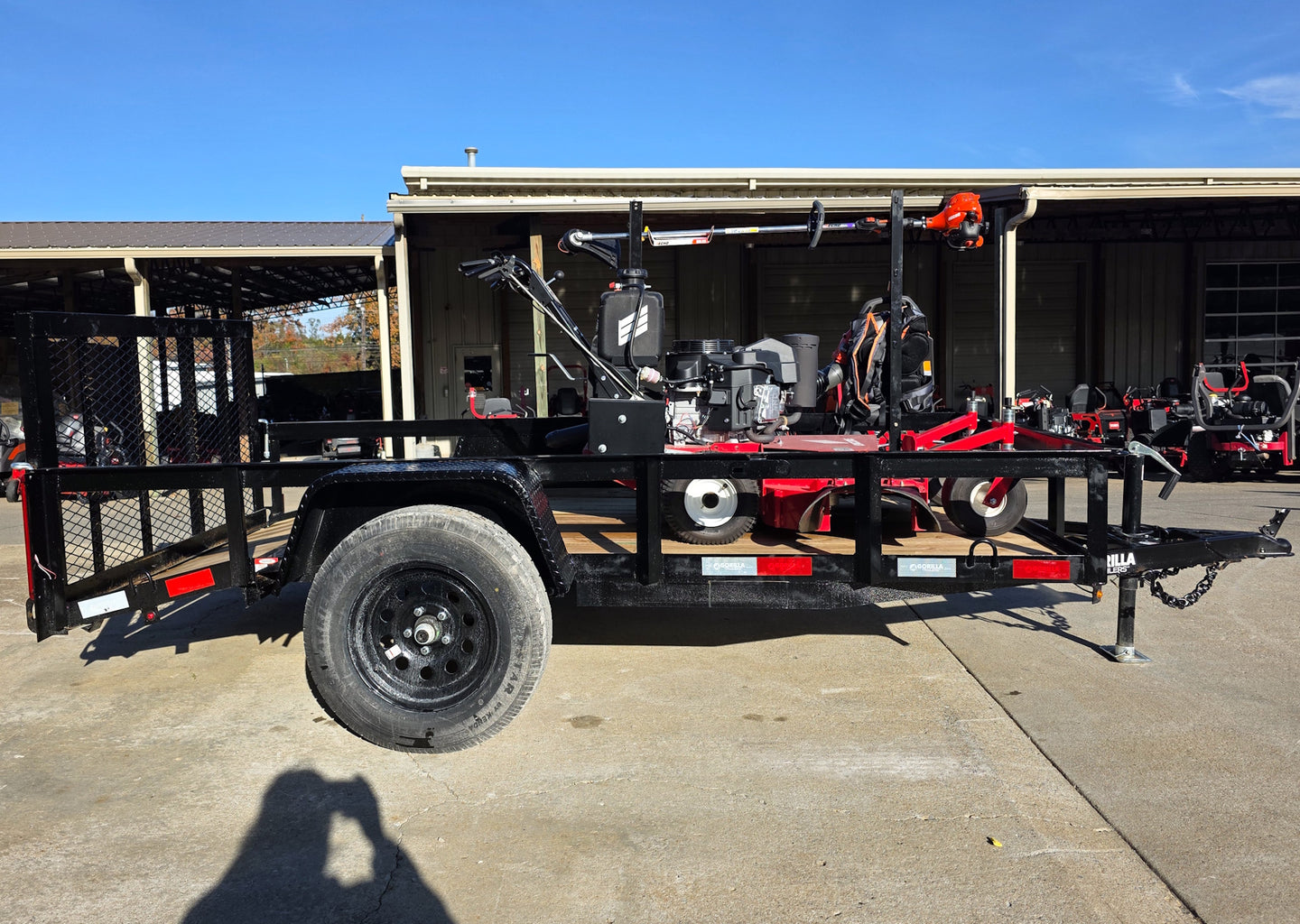 Encore EW32FS481V 32" Stand On Zero Turn Mower Handheld Utility with Racks Package Right Side Gate Up