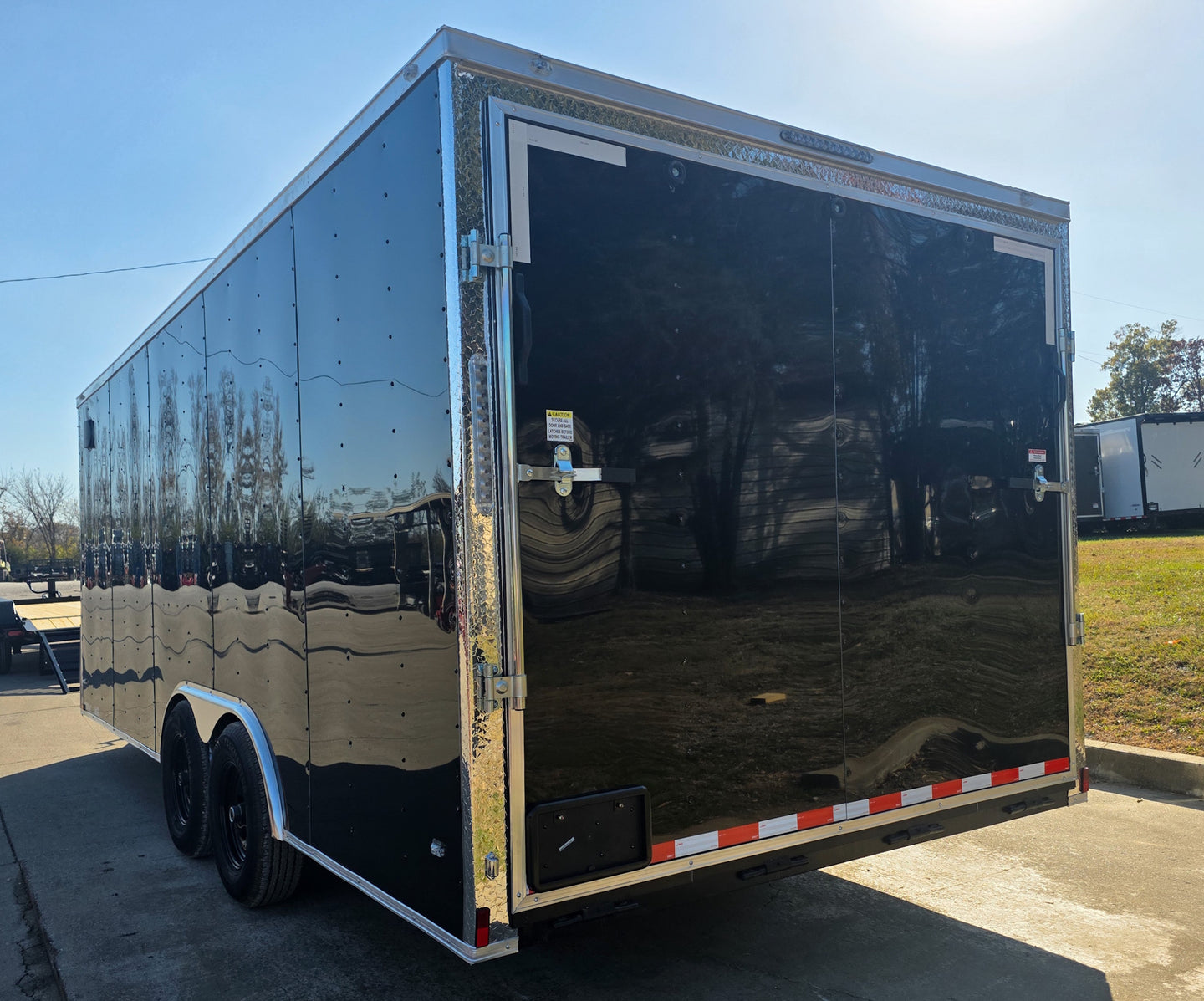 8.5x20 Black V-Nose Enclosed Trailer with Silver ATP (2) 52000lb Axles Left Rear 