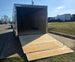 8.5x20 Black V-Nose Enclosed Trailer with Silver ATP (2) 52000lb Axles Left Rear Ramp Down