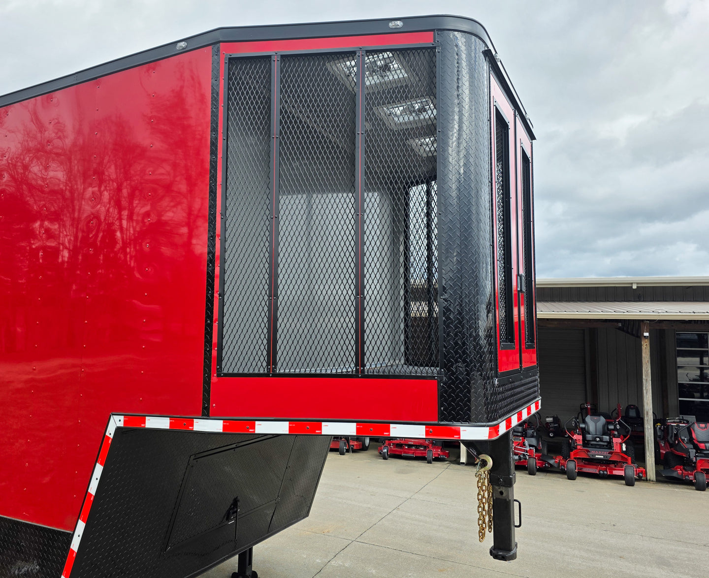 8.5x42 Red Gooseneck Enclosed Trailer Generator Cage with Rear Gullwing (3) 7000k Axles Generator Cage Right Side 