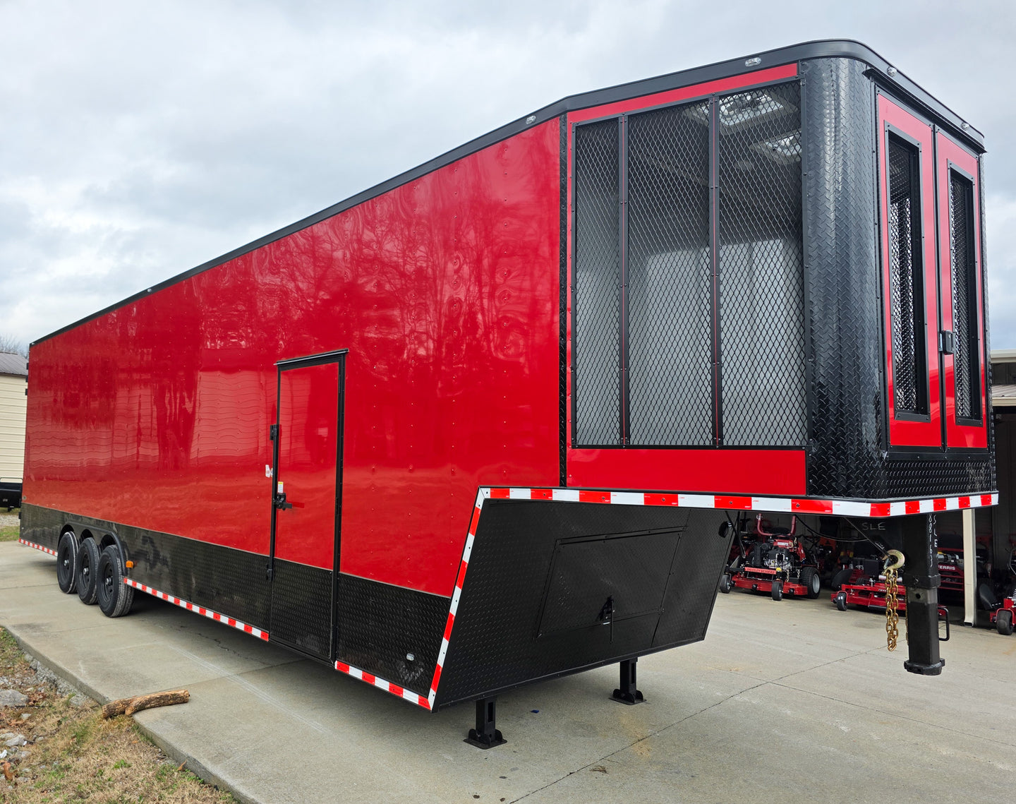 8.5x42 Red Gooseneck Enclosed Trailer Generator Cage with Rear Gullwing (3) 7000k Axles Front Right 