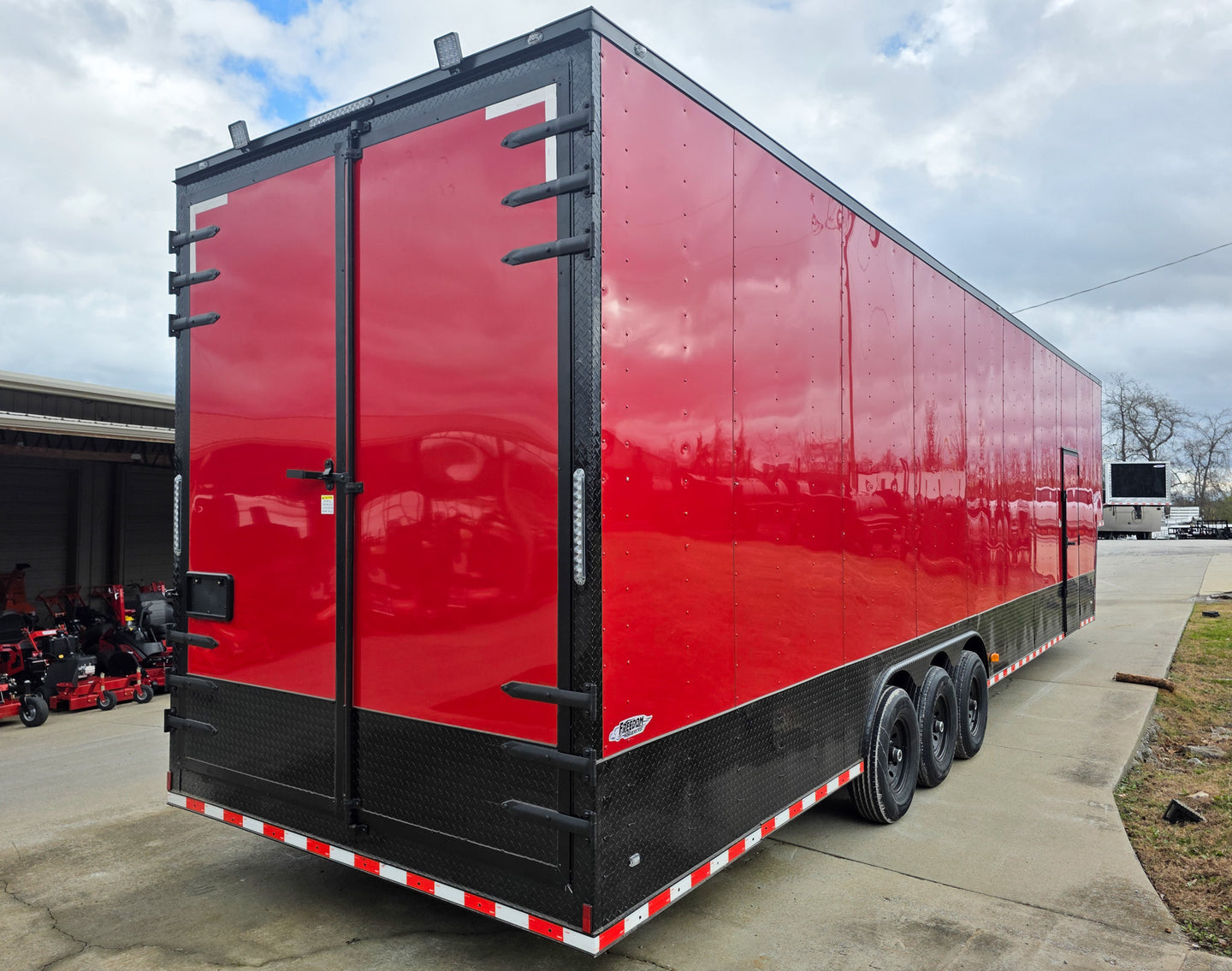 8.5x42 Red Gooseneck Enclosed Trailer Generator Cage with Rear Gullwing (3) 7000k Axles Right Rear