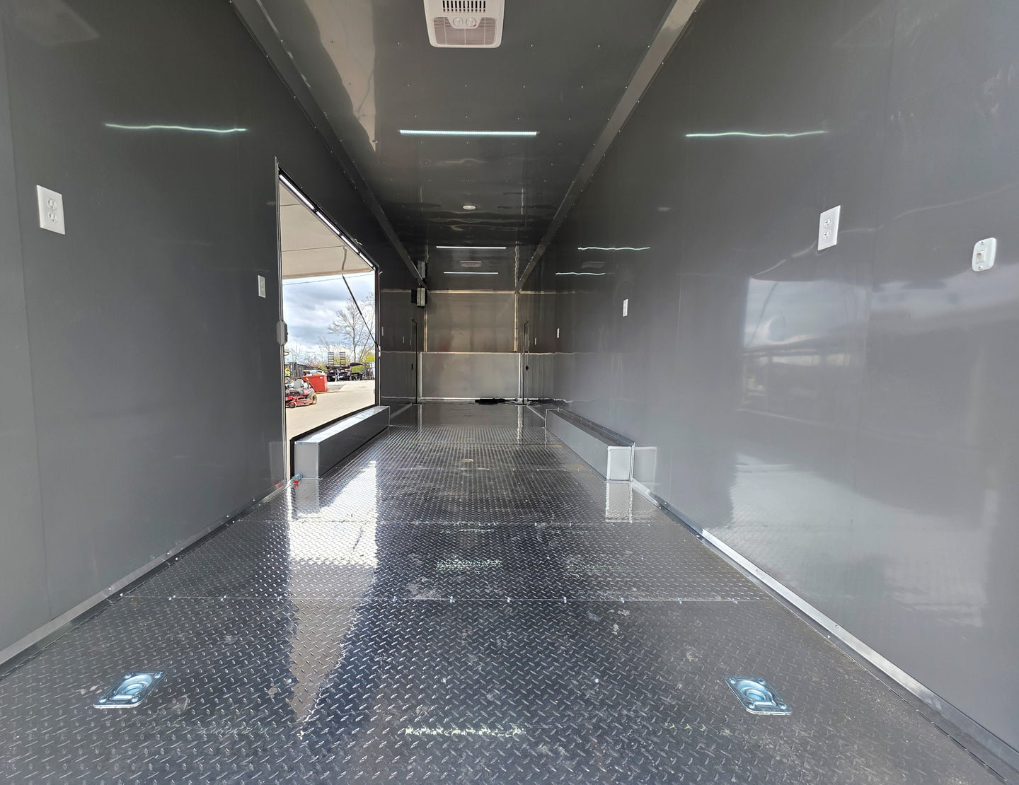 8.5x42 Red Gooseneck Enclosed Trailer Generator Cage with Rear Gullwing (3) 7000k Axles Rear Inside 