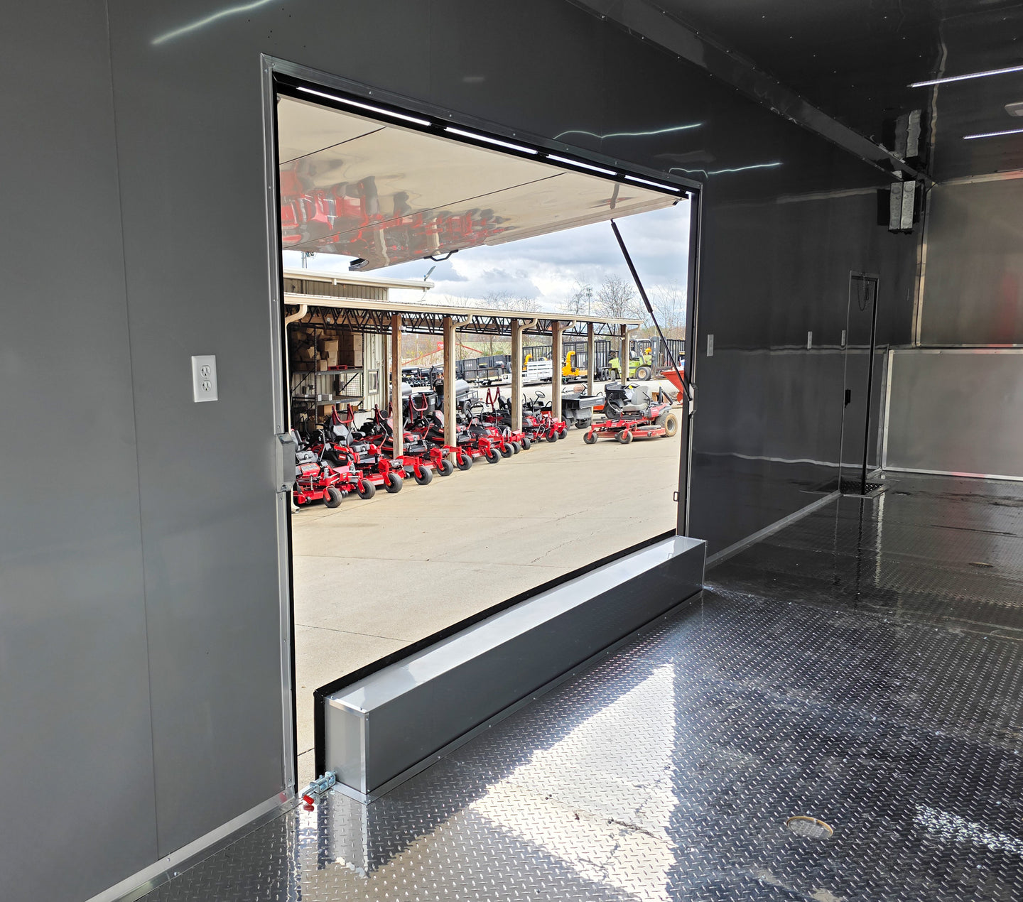 8.5x42 Red Gooseneck Enclosed Trailer Generator Cage with Rear Gullwing (3) 7000k Axles Inside Gullwing Open