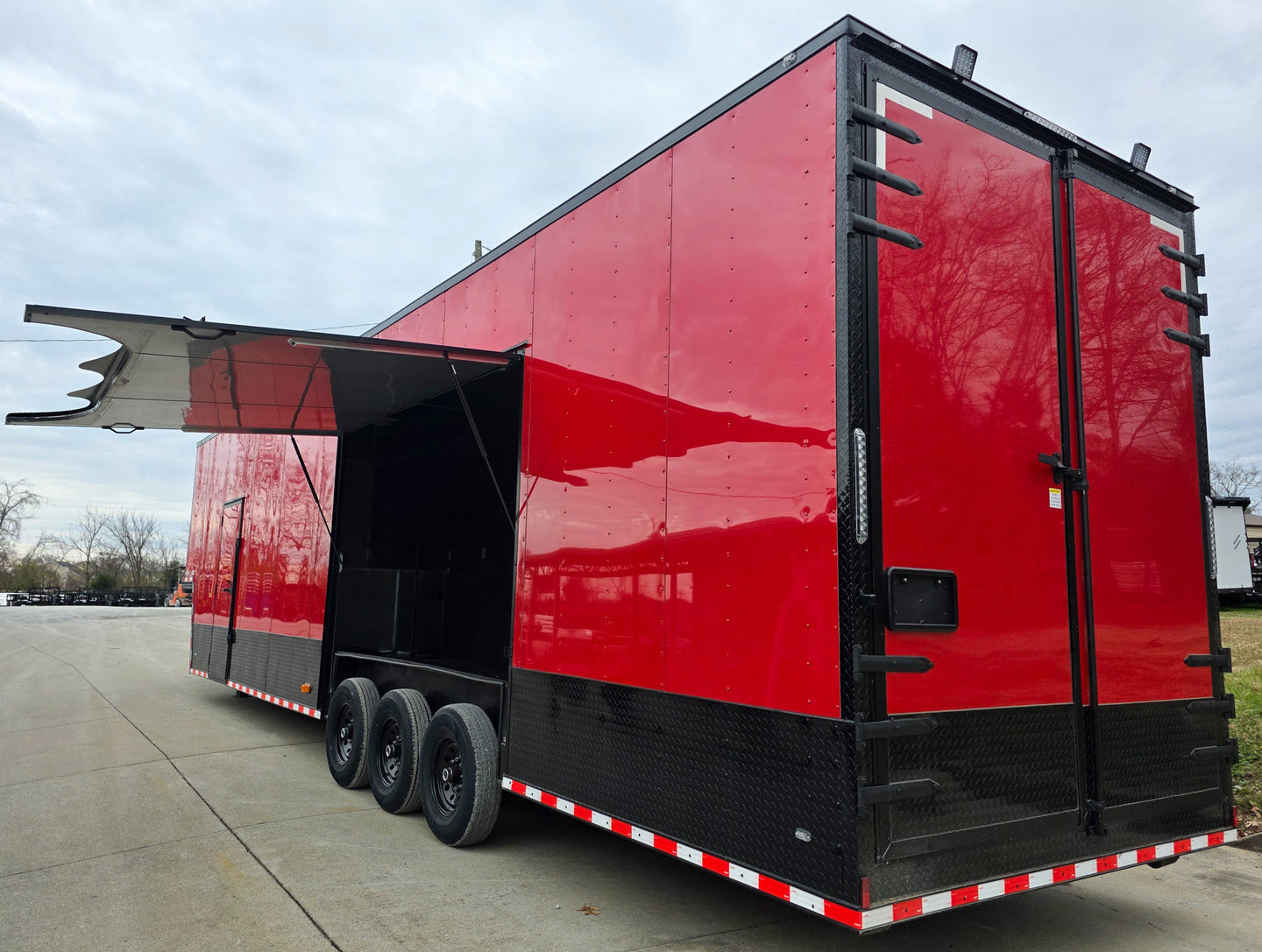 8.5x42 Red Gooseneck Enclosed Trailer Generator Cage with Rear Gullwing (3) 7000k Axles Rear Gullwing Open Left Rear