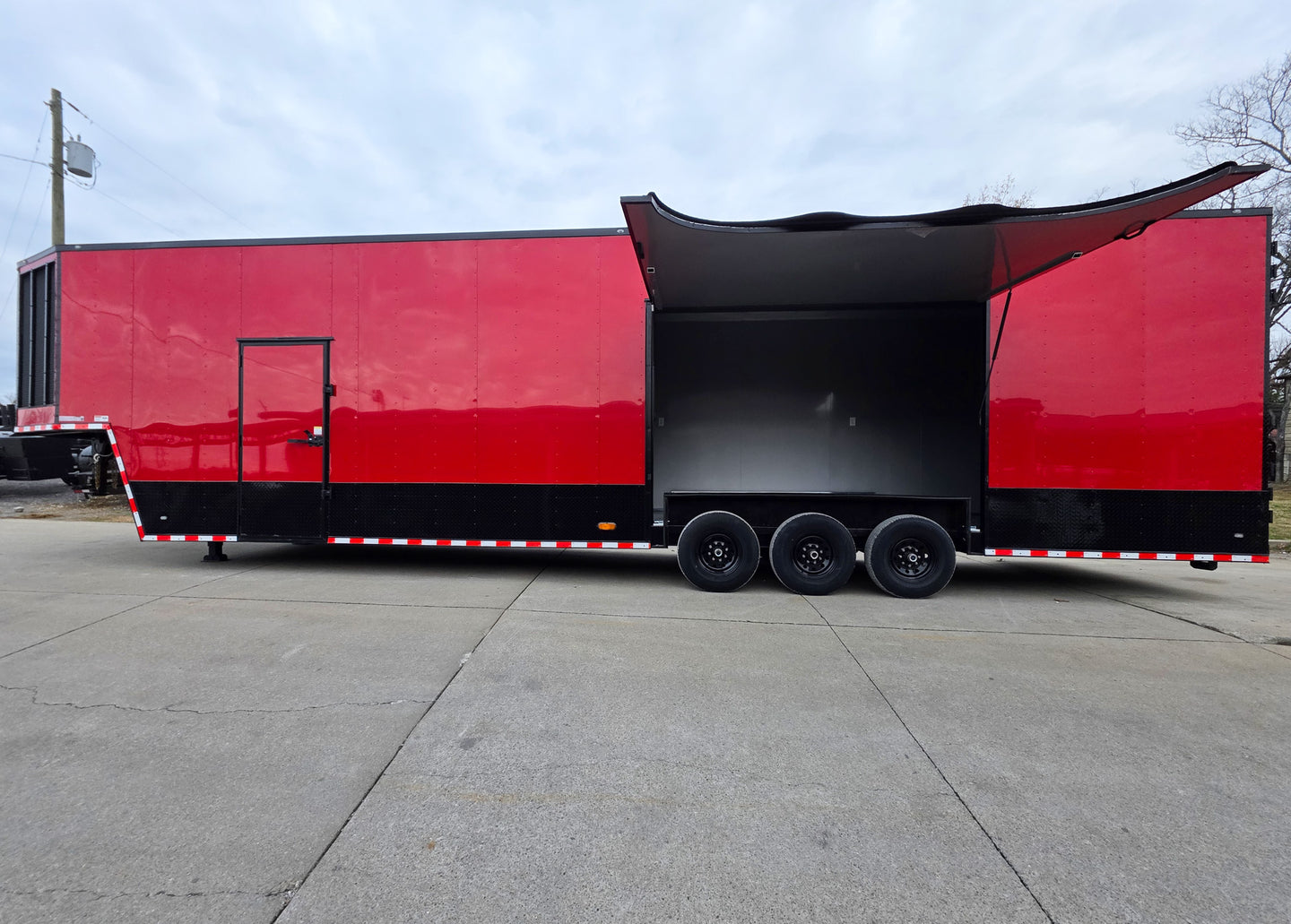8.5x42 Red Gooseneck Enclosed Trailer Generator Cage with Rear Gullwing (3) 7000k Axles Left Side Gullwing Open