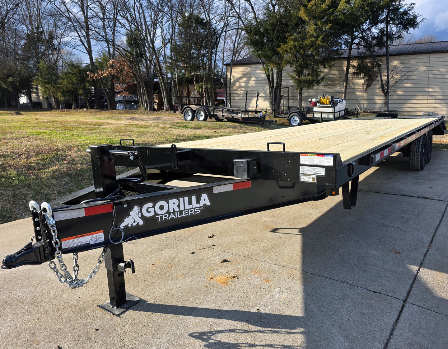 8.5x30 IBeam Deckover Trailer Dovetail (2) 7K Axles King Kong Ramps 14k GVWR Front Left 