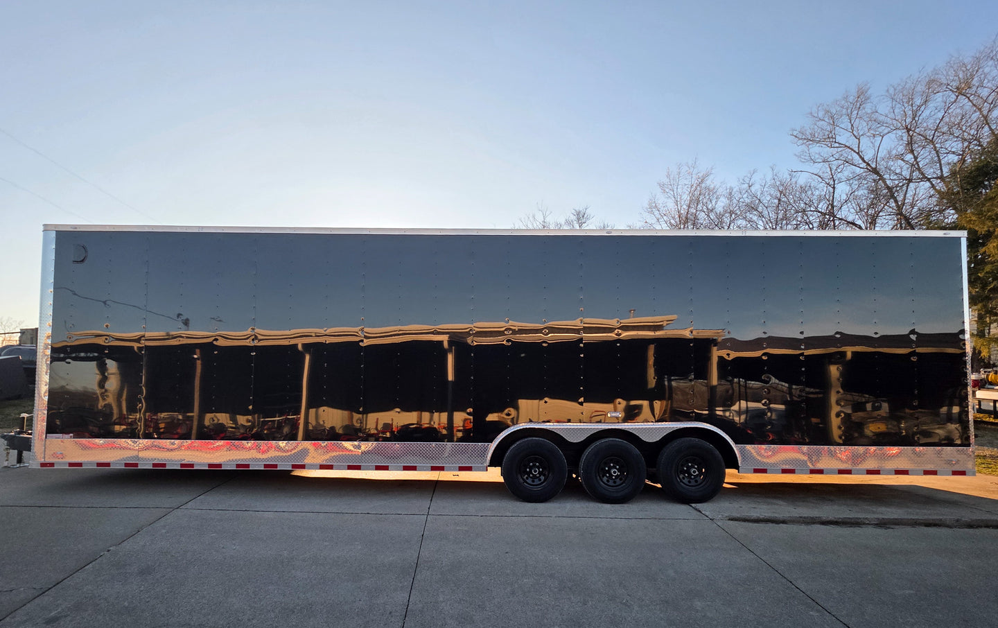8.5x34 Black Flat Nose Enclosed Trailer (3) 5200lb Axles Left Side 