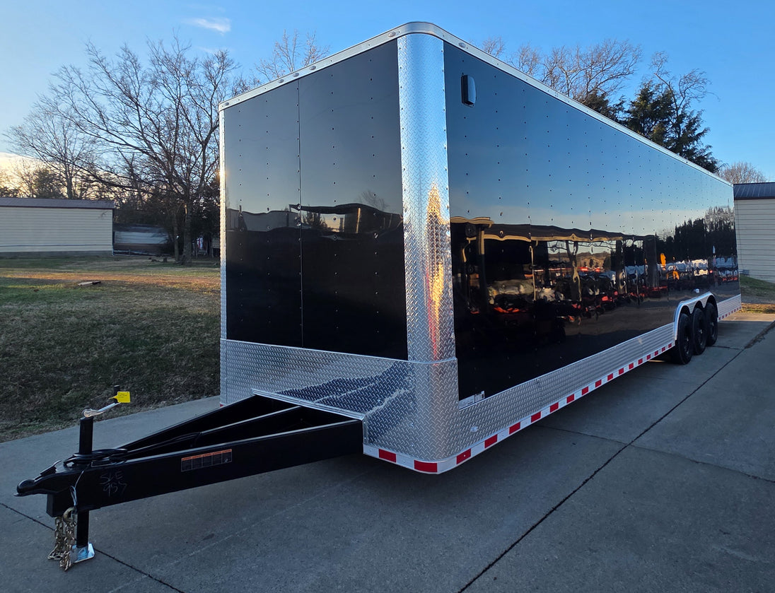 8.5x34 Black Flat Nose Enclosed Trailer (3) 5200lb Axles Front Left 
