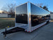 8.5x34 Black Flat Nose Enclosed Trailer (3) 5200lb Axles Front Left 