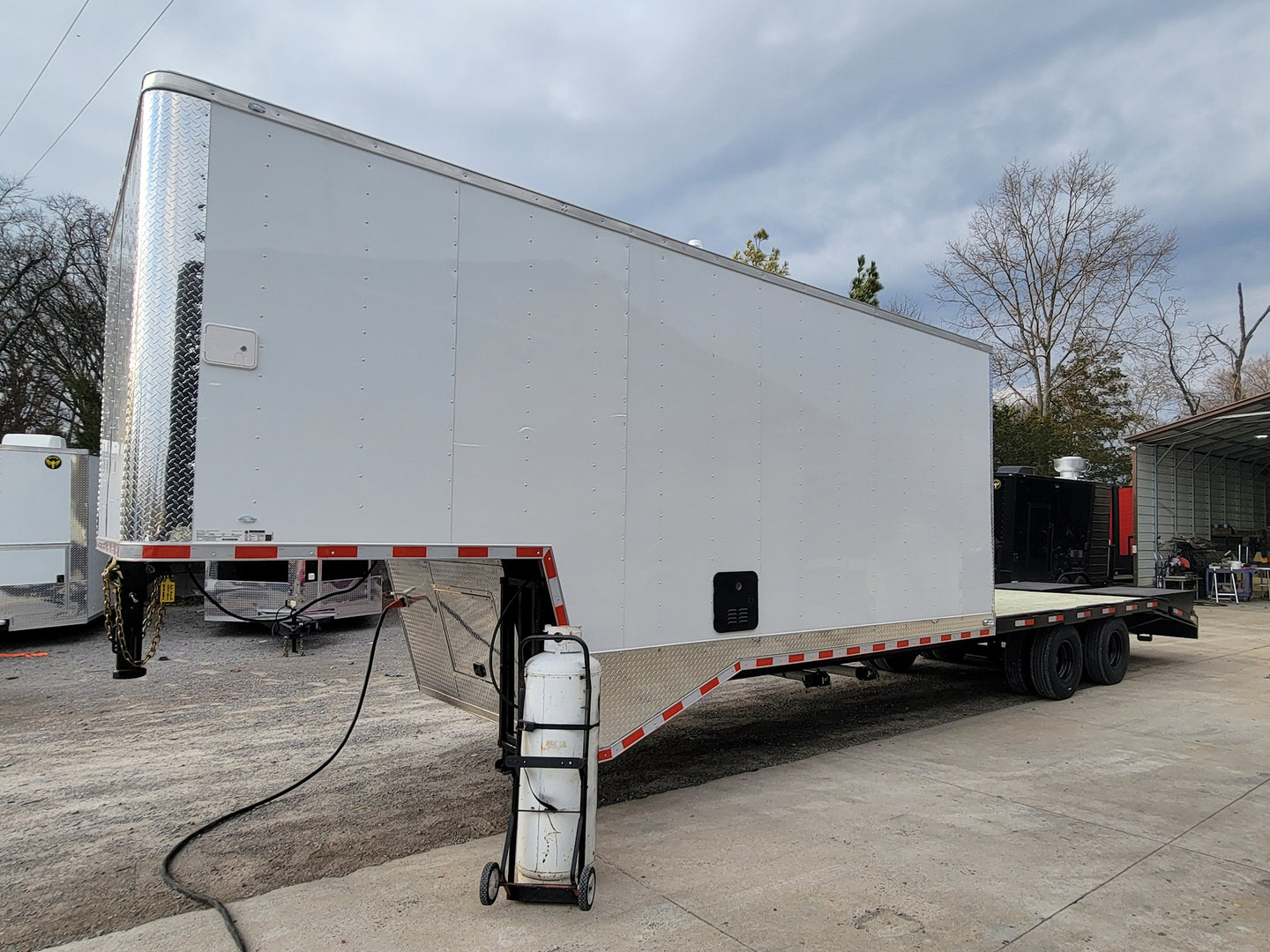 8.5' X 38' Custom Gooseneck Hybrid Equipment and Toy Hauler Trailer - SLE Equipment - 3