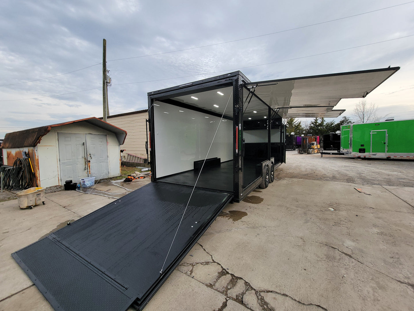 8.5' X 24' Black W/ Blackout Custom Merchandising Enclosed and Event Trailer - SLE Equipment - 8