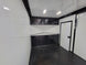 8.5' X 24' Black W/ Blackout Custom Merchandising Enclosed and Event Trailer - SLE Equipment - 17