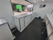 8.5' X 26' Custom Enclosed Merchandise and Marketing Trailer with Black Out Trim - SLE Equipment - 25