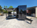 8.5' X 24' Custom Enclosed Stage Trailer Black With Black Out Trim and Awning - SLE Equipment - 9