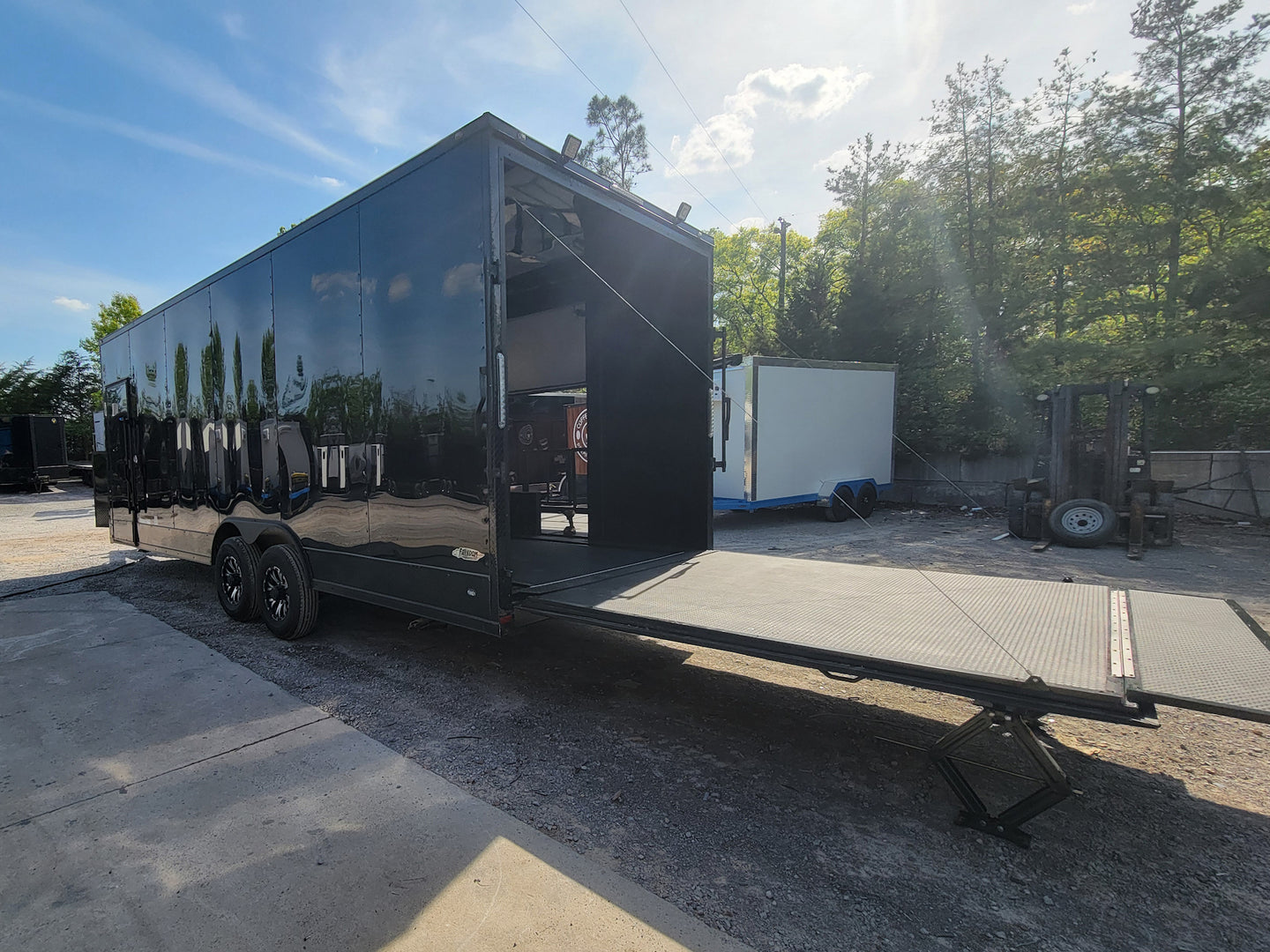 8.5' X 24' Black With Blackout Stage Trailer With Awning Semi Screwless Exterior - SLE Equipment - 8