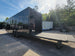 8.5' X 24' Black With Blackout Stage Trailer With Awning Semi Screwless Exterior - SLE Equipment - 8