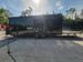 8.5' X 24' Black With Blackout Stage Trailer With Awning Semi Screwless Exterior - SLE Equipment - 9