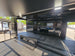 8.5' X 24' Black With Blackout Stage Trailer With Awning Semi Screwless Exterior - SLE Equipment - 17