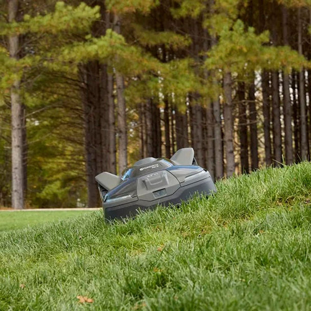 Robotic mower with EPOS™ wire-free boundaries. App controlled with quiet battery operation, adjustable cutting height, and automatic charging.