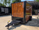 7' X 12' Concession Trailer Woodgrain With Blackout Trim Food Event Catering Front right angle picture 