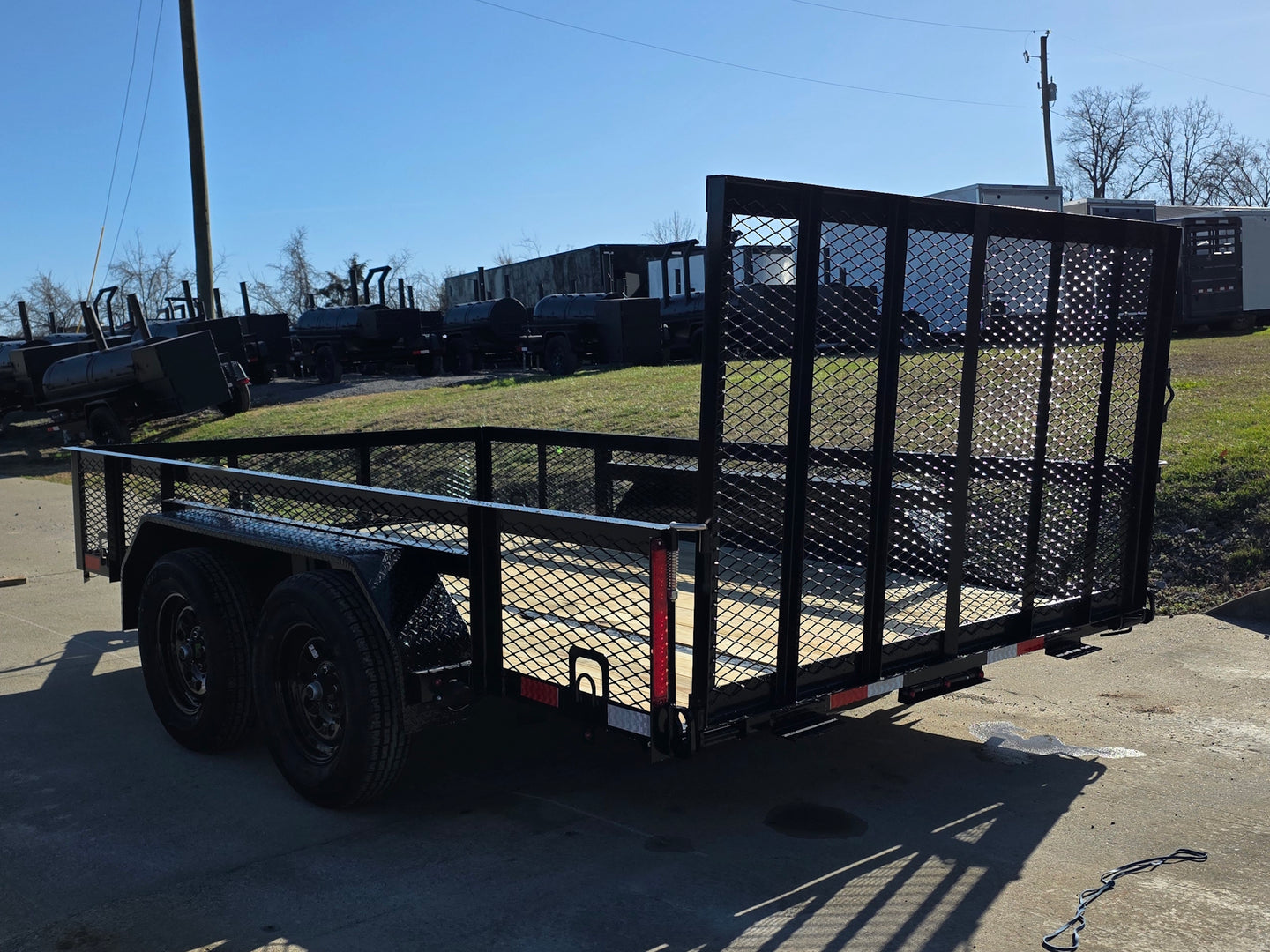 7' X 12' Straight Deck Utility Trailer 18IN Mesh Sides Double Axle 7K GVWR back left angled view picture 