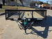 7' X 12' Straight Deck Utility Trailer 18IN Mesh Sides Double Axle 7K GVWR front view picture with ramp down 