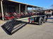 7 X 14 Straight Deck Utility Trailer With 12" Mesh Sides (2) 3,500lb Axles back right view picture with ramp down 