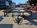 7 X 14 Straight Deck Utility Trailer With 12" Mesh Sides (2) 3,500lb Axles front view picture with ramp down 