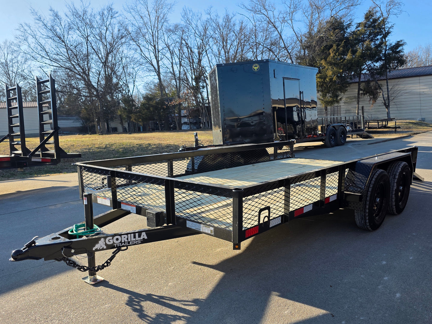 7 X 14 Straight Deck Utility Trailer With 12" Mesh Sides (2) 3,500lb Axles front right angled view picture with ramp down