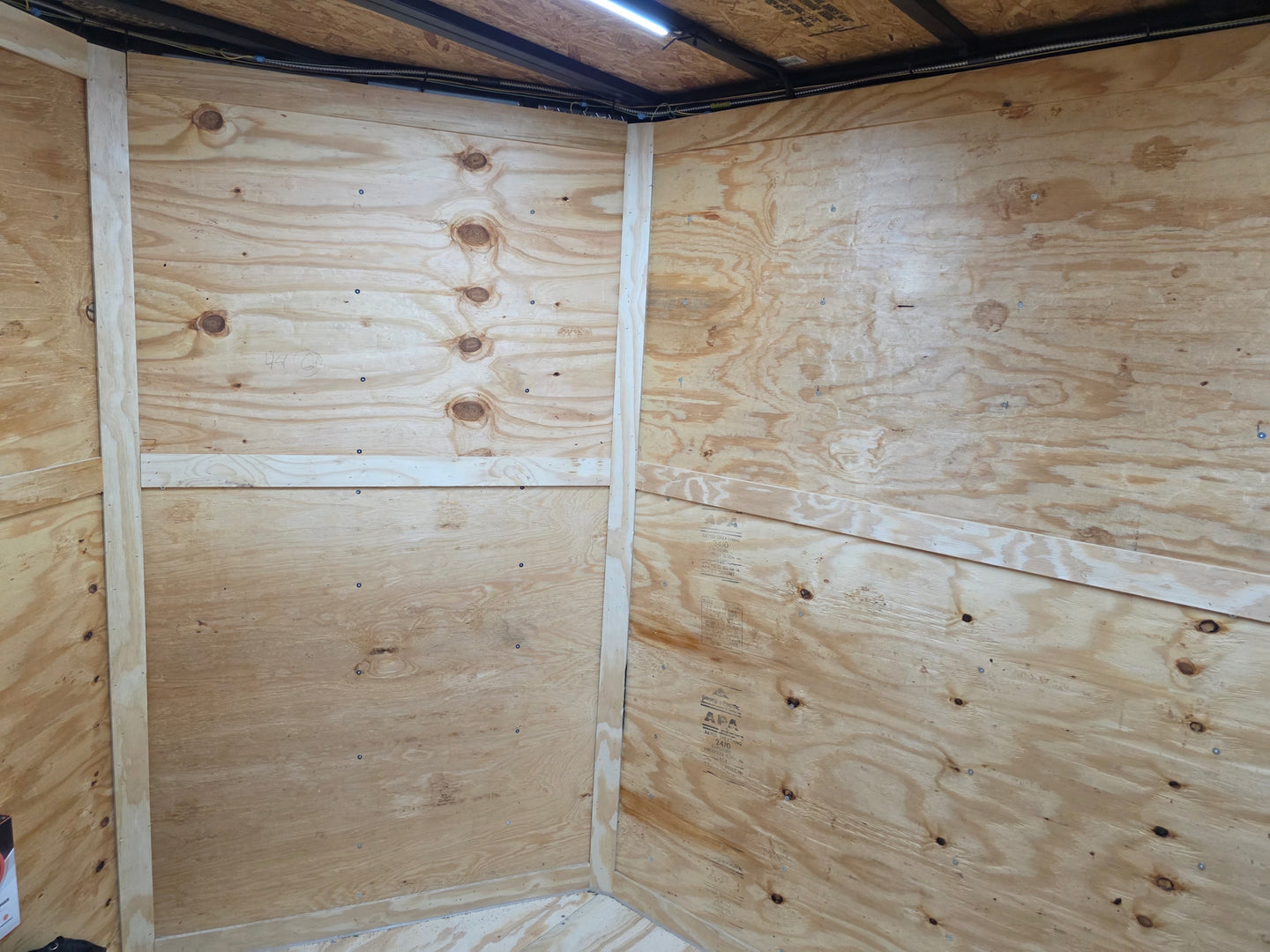7x14 Enclosed Hybrid 2-3500lb axles Interior back left angle picture 