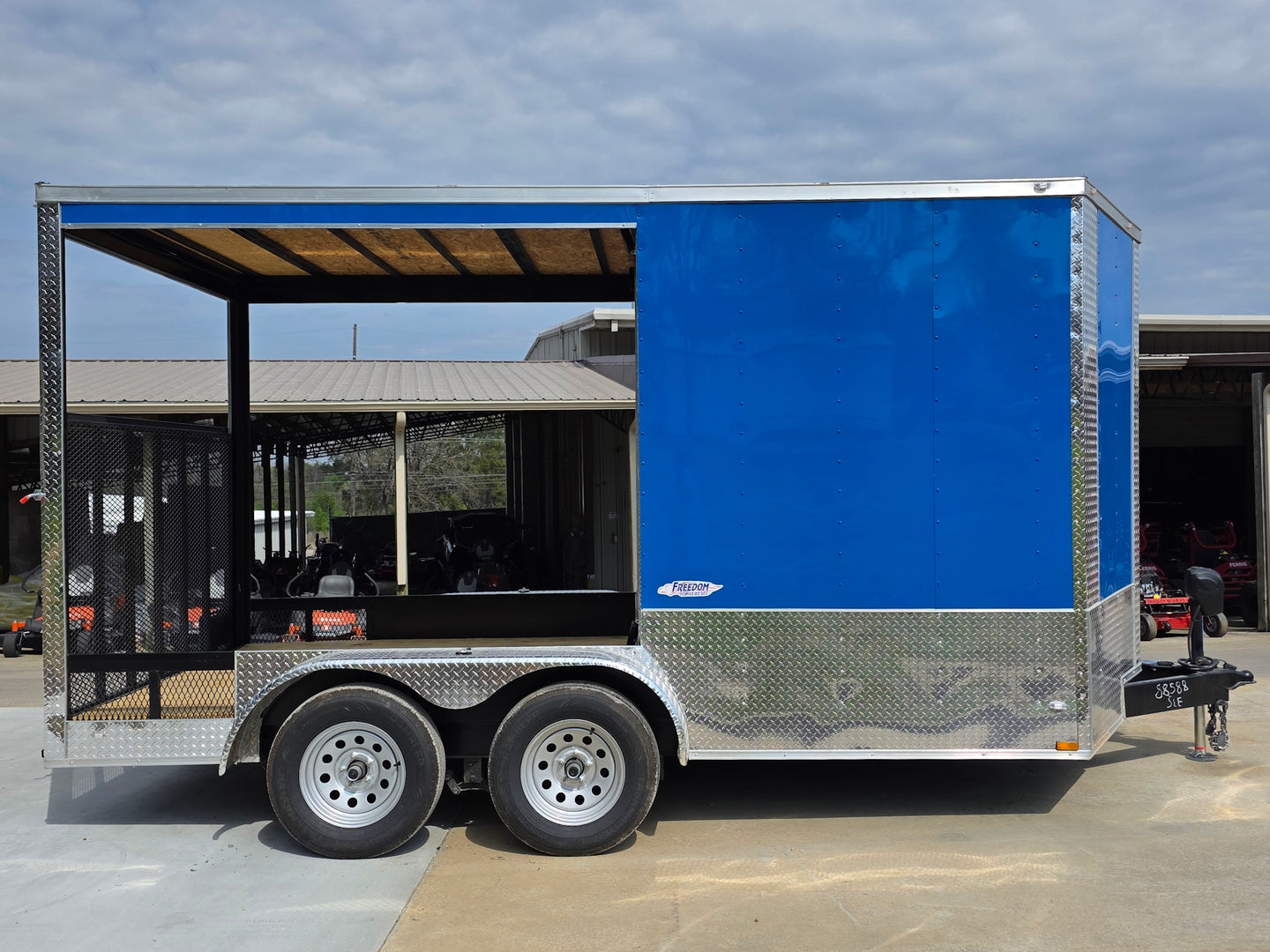 7x14 Enclosed Hybrid 2-3500lb axles Left side picture 