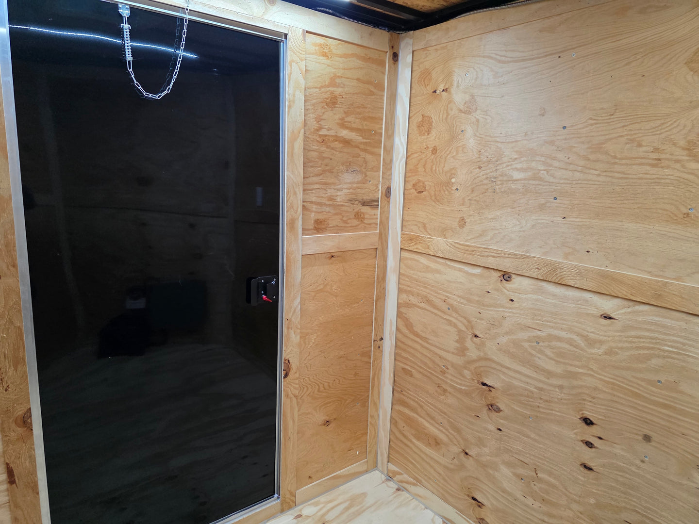 7x14 Enclosed Hybrid 2-3500lb axles Interior front left angle picture  