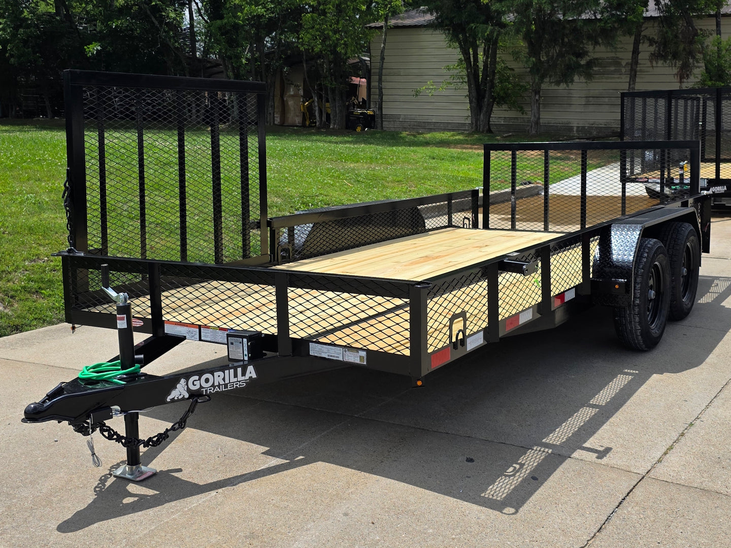7x16 Dovetail Utility Trailer with 1FT Mesh Side Gate (2) 3500lb Axle 7k GVWR Front right angle picture 