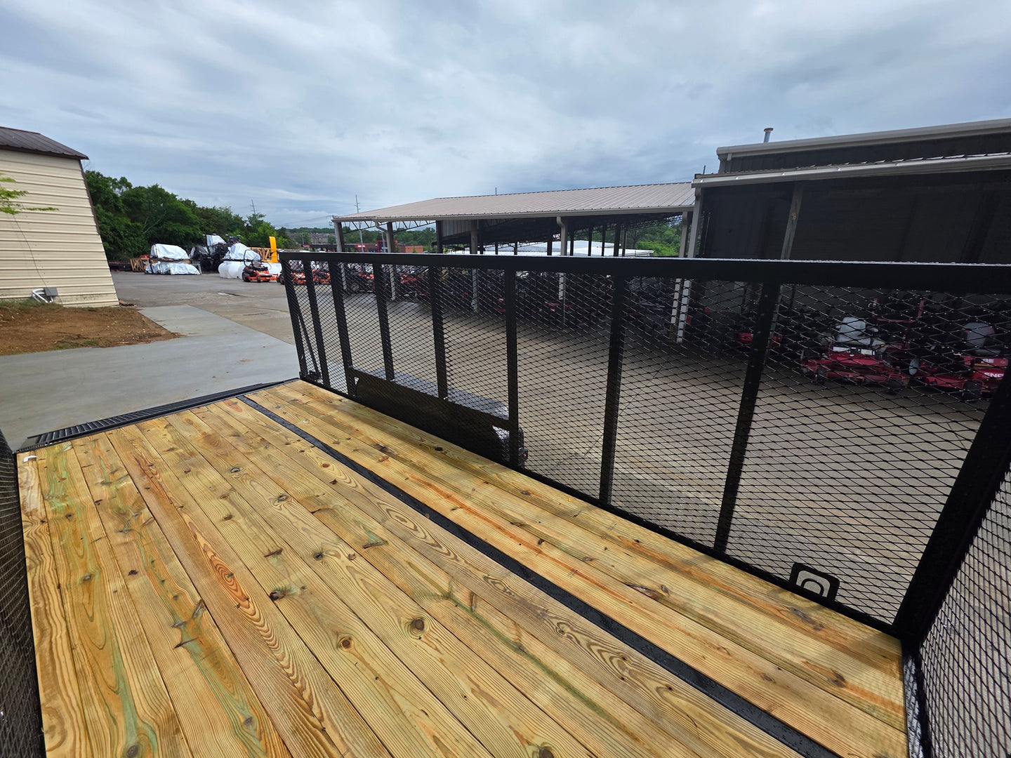 7x16 Powder Coated Straight Deck Utility Trailer with 4.5ft Mesh Sides (2) 3500lb Axles Interior front left angle picture 