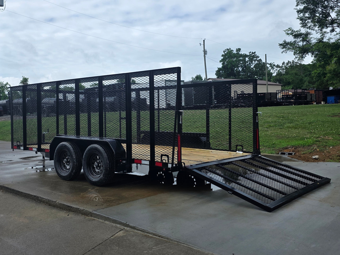 7x16 Powder Coated Straight Deck Utility Trailer with 4.5ft Mesh Sides (2) 3500lb Axles Open back left angle picture 