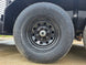 7x16 Straight Deck (2) 5200lb axles 2ft mesh 6ft ladder racks Tire picture 