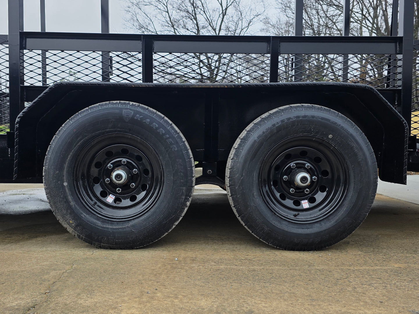 7x16 Straight Deck (2) 5200lb axles 2ft mesh 6ft ladder racks axel picture