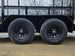 7x16 Straight Deck (2) 5200lb axles 2ft mesh 6ft ladder racks axel picture